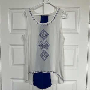 White Sleeveless Top with Blue Geometric Design